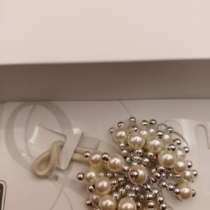 nœud crème et perles
