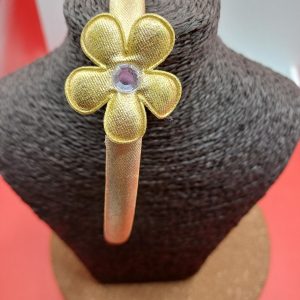 Serre tête doré et fleur