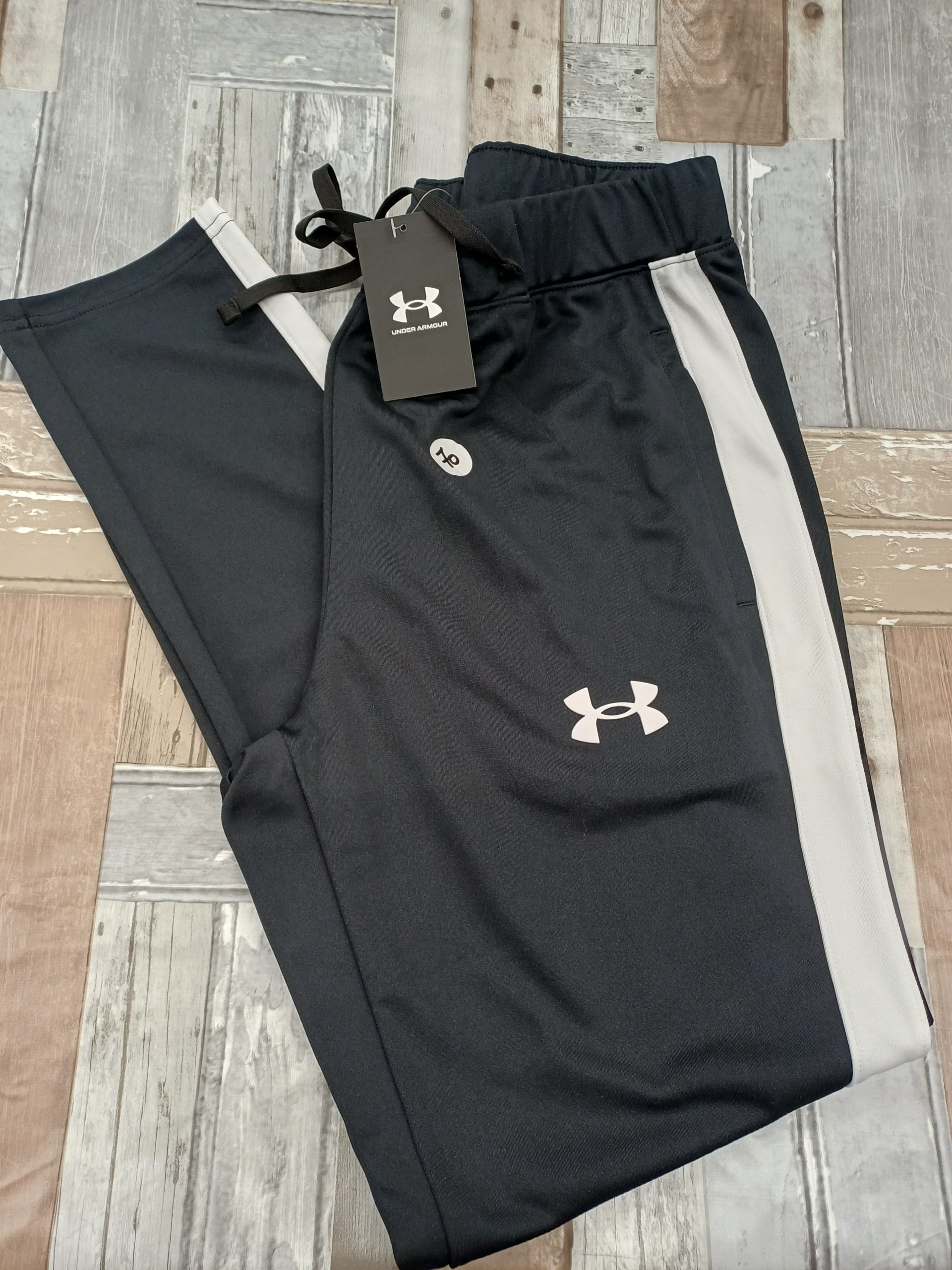 Bas de survêtement Under Armour Taille L. noir